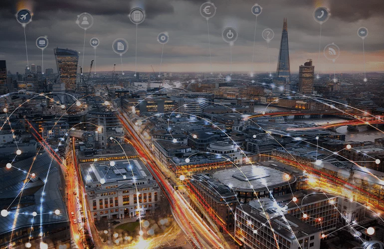 Smart city skyline with digital network connections illustrating connected software systems and data flow