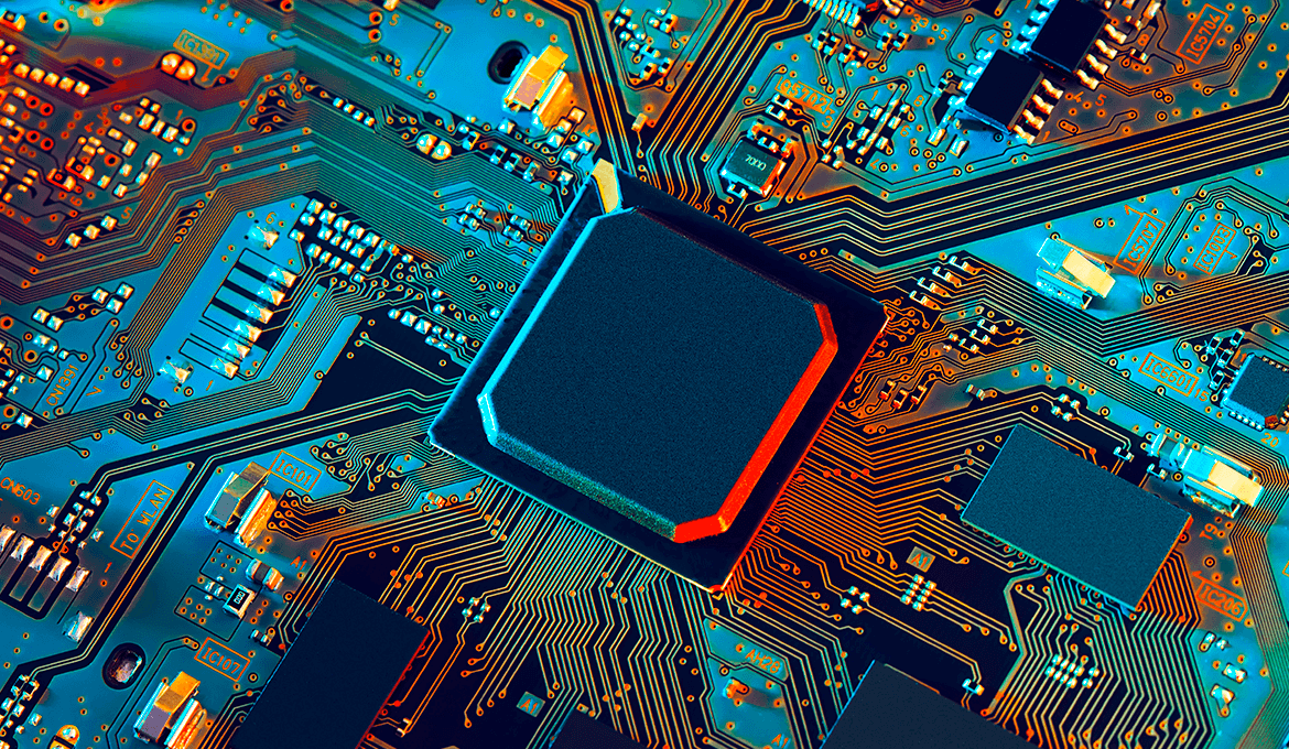 Close-up of microchip on circuit board, representing embedded unit testing and hardware validation