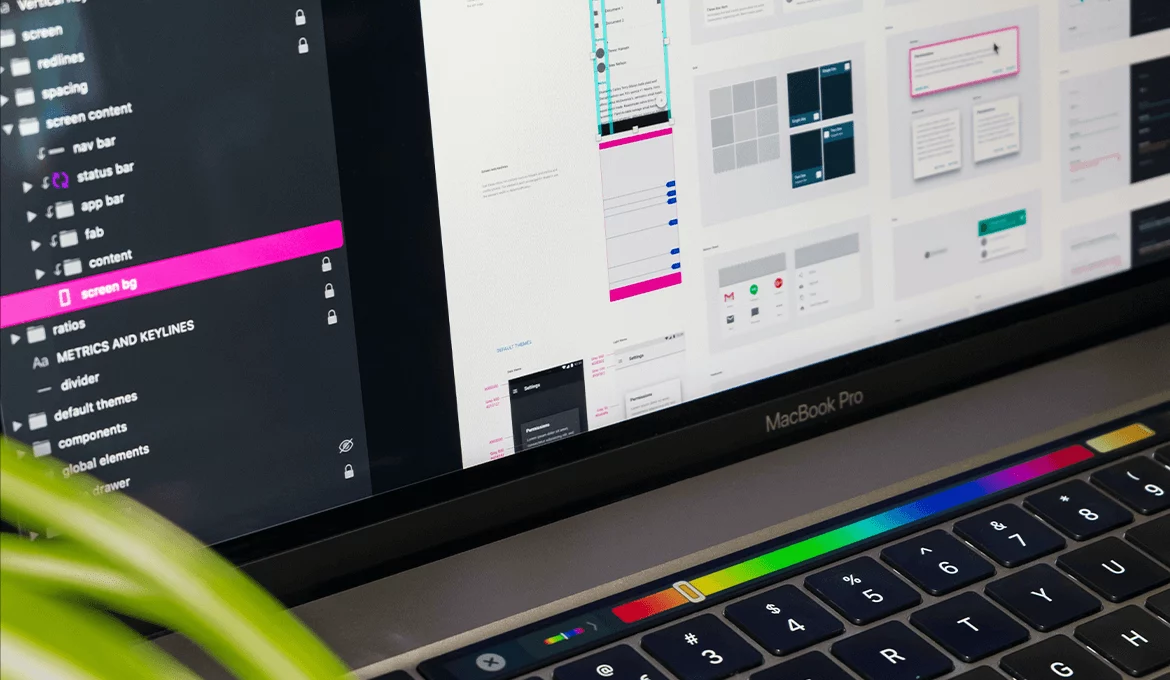 MacBook Pro displaying software interface layouts and components for security-focused application review