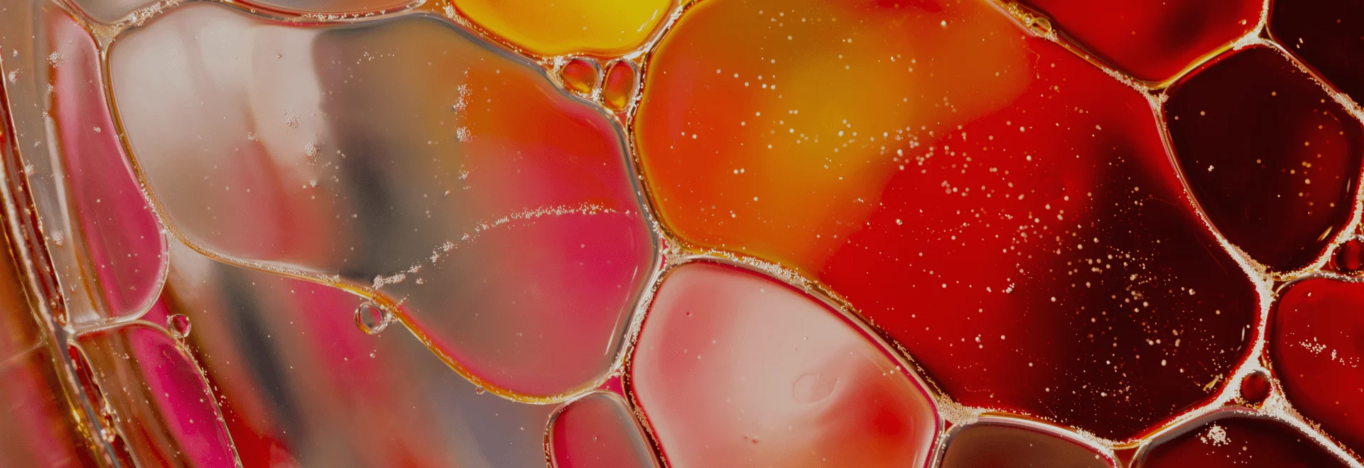 Abstract red and orange fluid pattern symbolizing connected systems and seamless integration testing