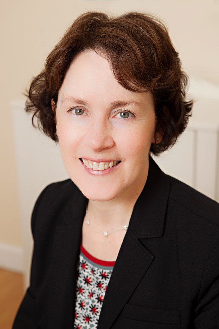 Professional headshot of Karen N. Johnson smiling in black blazer