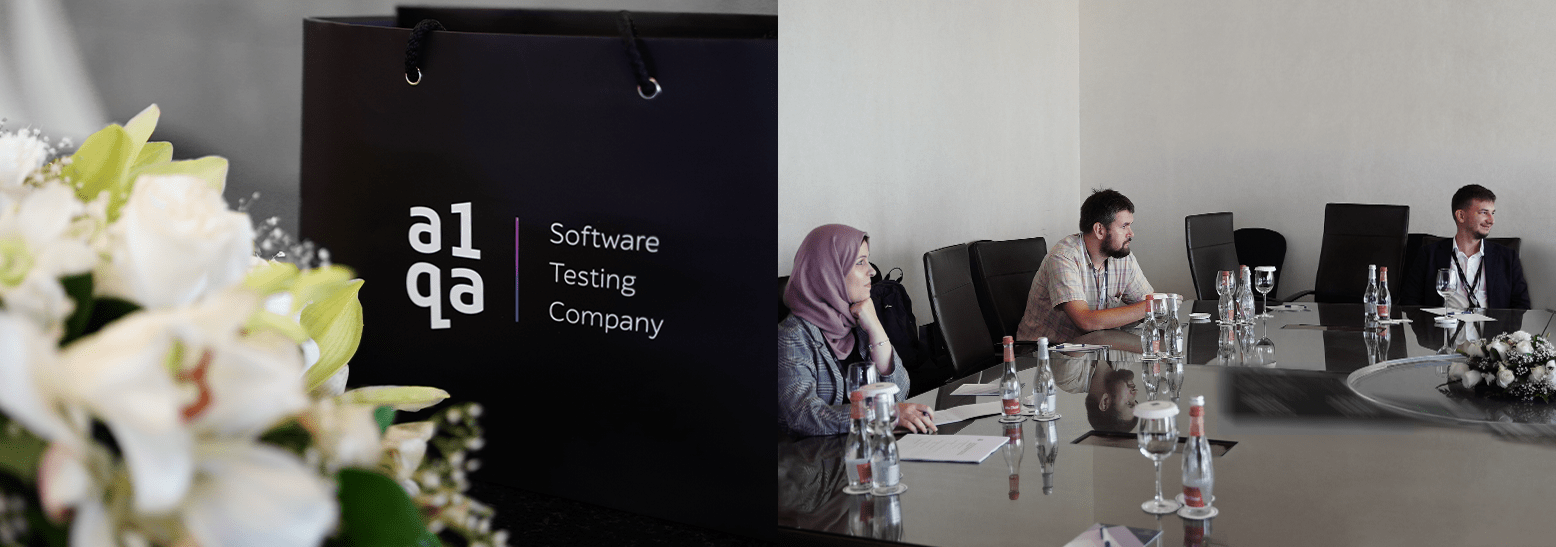 a1qa Software Testing Company branded bag beside participants at a roundtable meeting