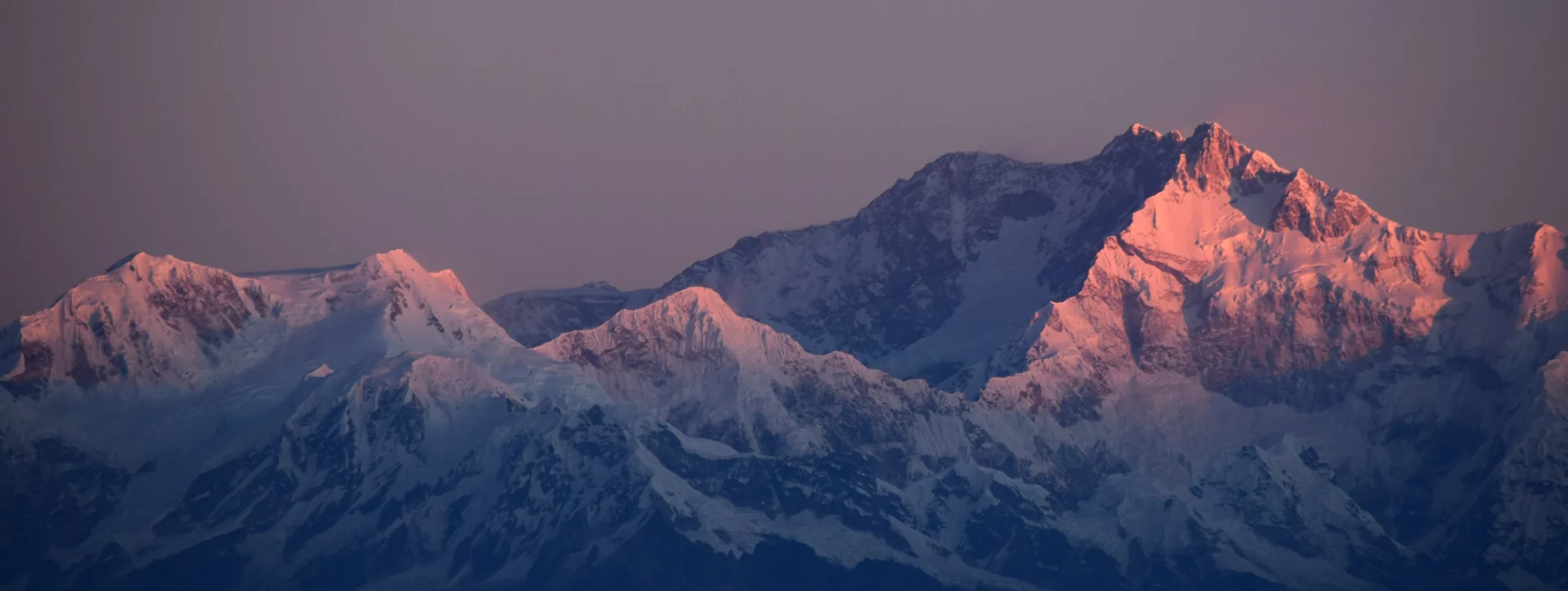 Sunlit mountain peaks symbolizing accelerated high-quality software delivery through test automation