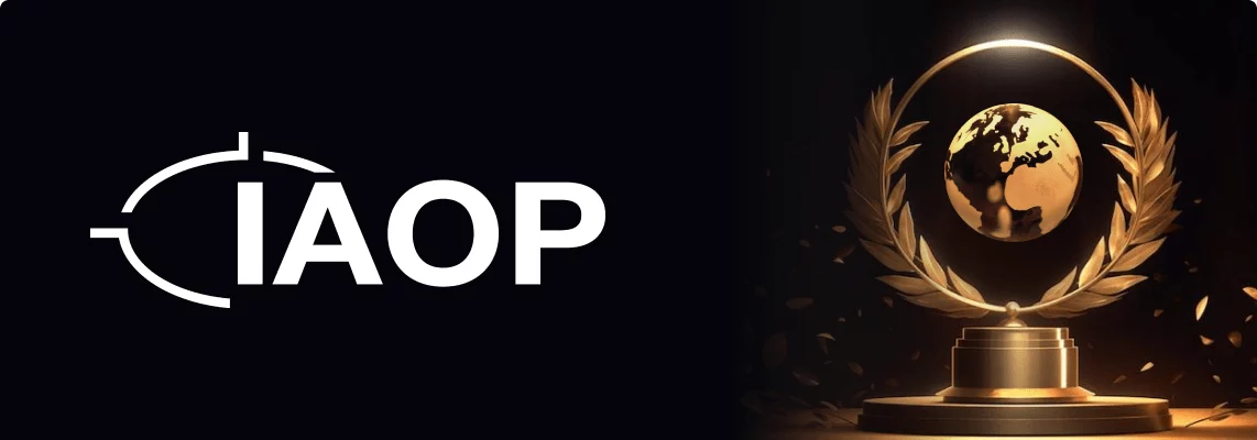 IAOP logo beside a golden globe trophy symbolizing industry awards and recognition